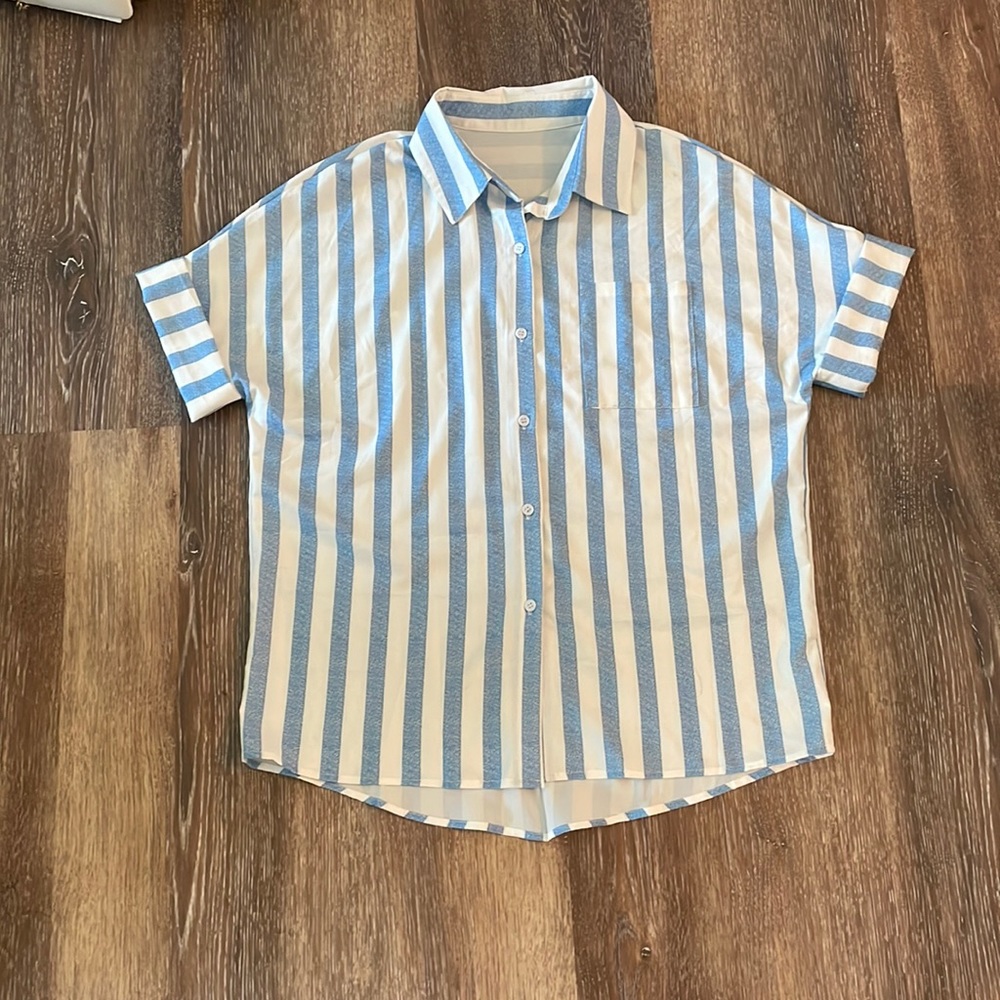 Striped collared shirt.